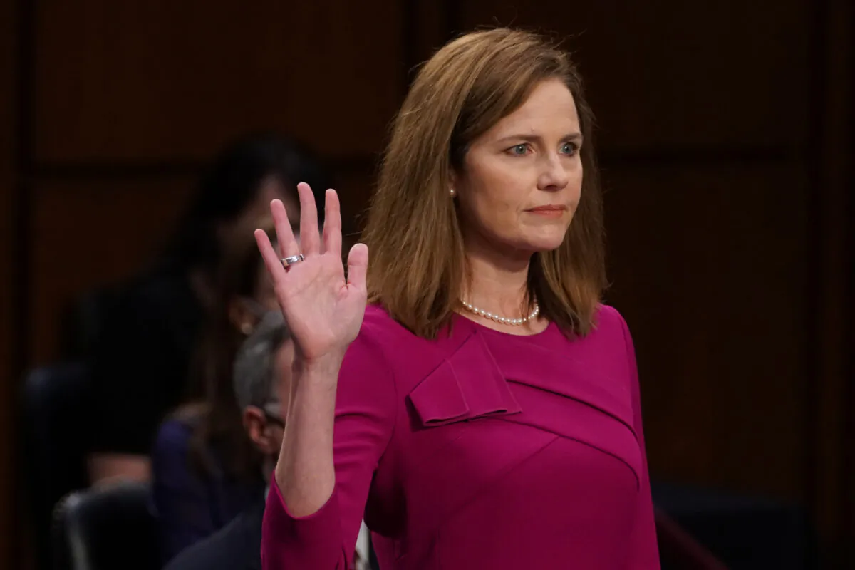 Supreme Court nominee Amy Coney Barrett is sworn in during confirmation hearing before the Senate Judiciary Committee on Capitol Hill in Washington on Oct. 12, 2020. (Stefani Reynolds/Pool via Reuters)