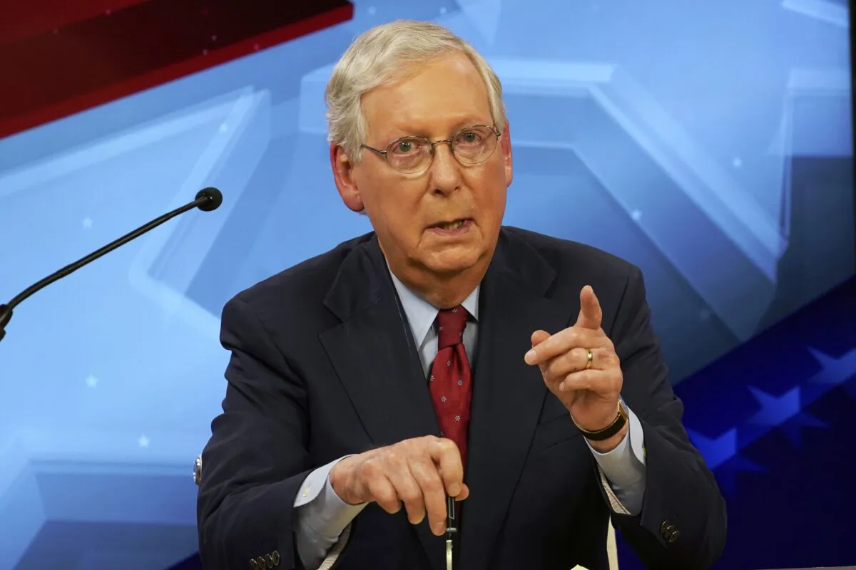 Senate Majority Leader Mitch McConnell (R-Ky.) speaks during a debate with Democratic Senate nominee Amy McGrath, in Lexington, Ky., on Oct. 12, 2020. (Michael Clubb/Pool/Getty Images)