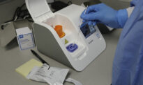 ID NOW Rapid COVID Test to Arrive This Week Amid Backlog of Unprocessed Tests