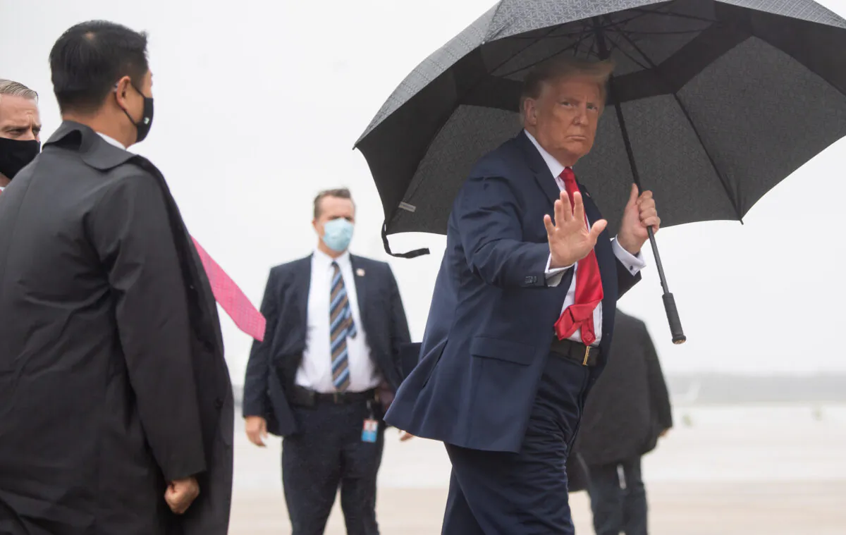 President Donald Trump boards Air Force One prior to departure from Joint Base Andrews in Maryland on Oct. 12, 2020. (Saul Loeb/AFP via Getty Images)