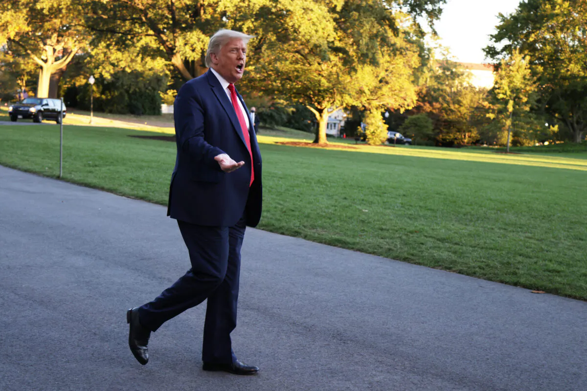 President Donald Trump speaks to members of the press prior to a Marine One departure from the White House on Oct. 13, 2020. (Alex Wong/Getty Images)