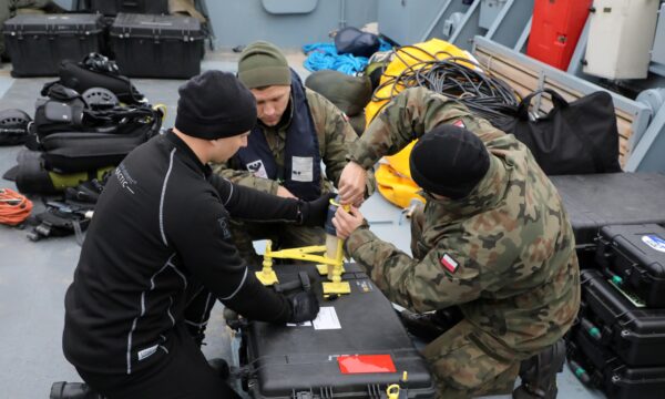 Navy divers take part in an operation to defuse the Tallboy bomb