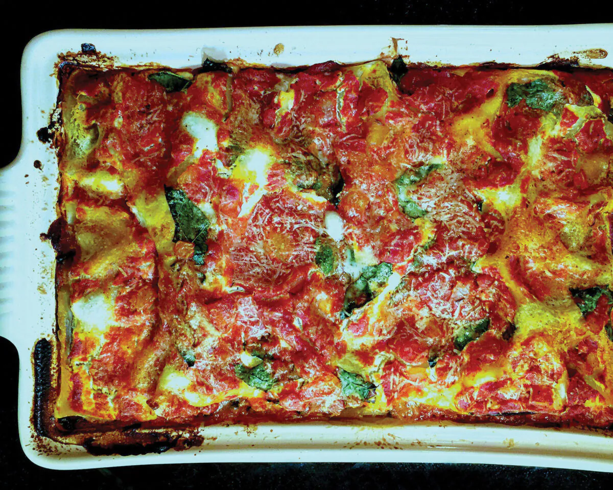 This hefty casserole is layered with three cheeses, a meaty tomato sauce and—wait for it—kale. (Lynda Balslev for TasteFood)