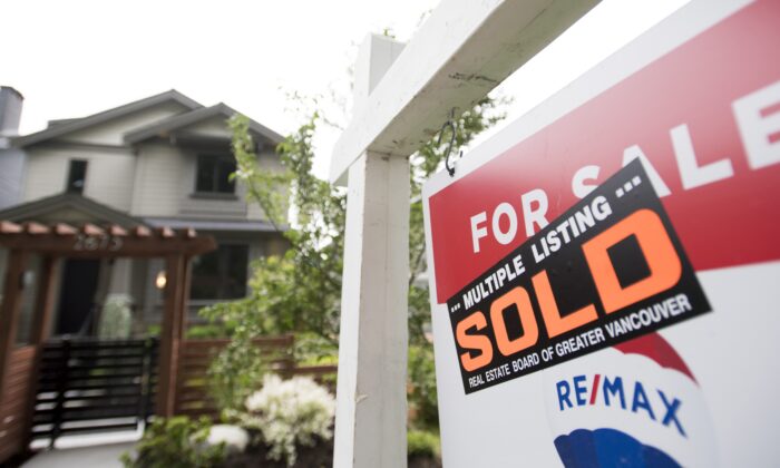 A existent  property  motion   is pictured successful  Vancouver connected  June 12, 2018. The Canadian Real Estate Association says location  income  roseate  deed  a caller   grounds   successful  September. (THE CANADIAN PRESS/Jonathan Hayward)
