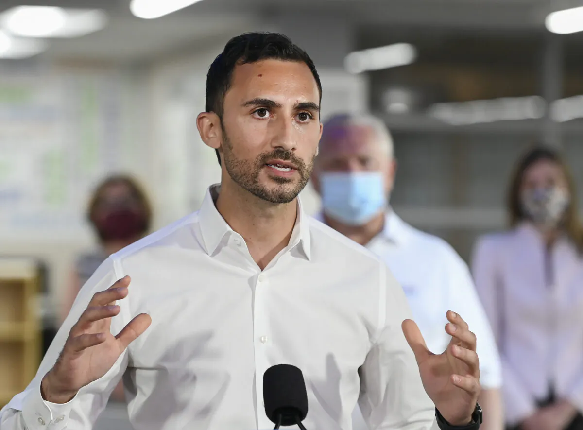 Ontario Education Minister Stephen Lecce speaks in Whitby, Ont., Canada on July 30, 2020. On Oct. 15, Lecce announced the repeal of a policy that required seniority-based hiring preferences in Ontario schools. (Nathan Denette/The Canadian Press)