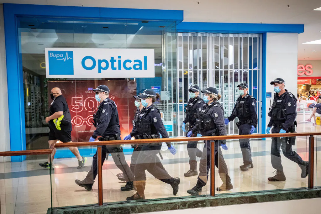 Members of Victoria Police patrol through Chadstone Shopping Centre in Melbourne, Australia on Sept. 20, 2020. (Darrian Traynor/Getty Images)