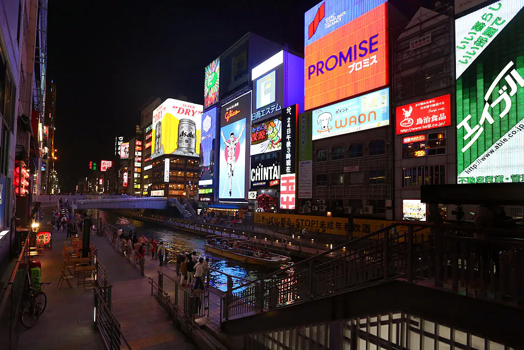 Brightly lit signs advertise businesses in the Dotonbori district of Osaka, Japan, on April 23, 2016. (Carl Court/Getty Images)