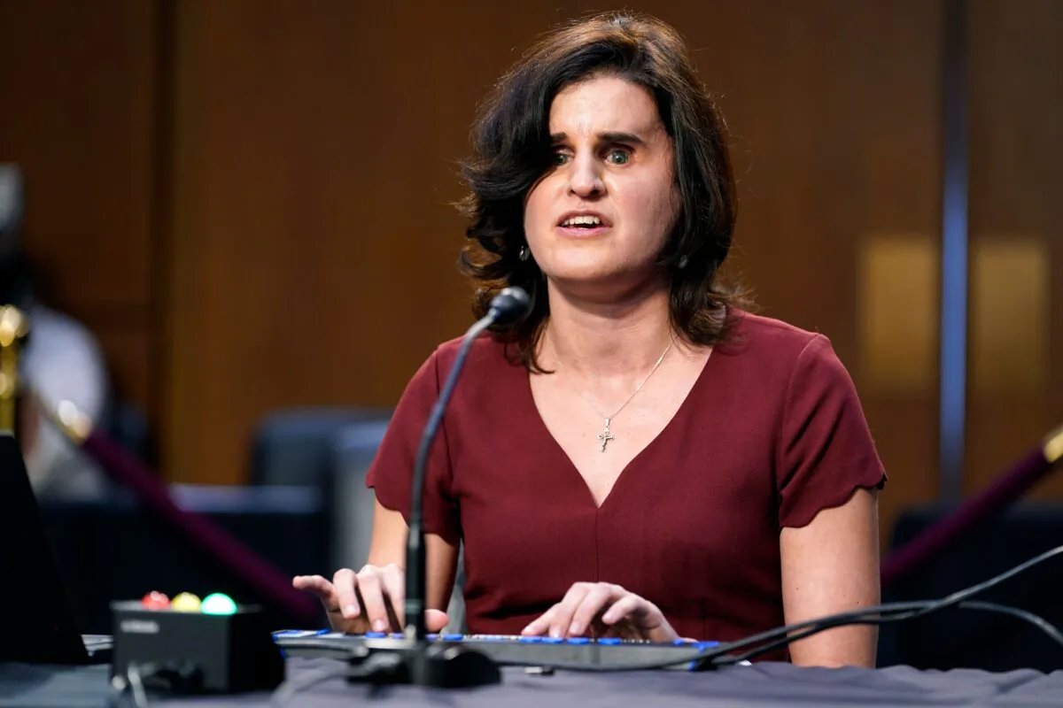 Laura Wolk, the first blind woman to clerk at the Supreme Court and a former student of Barrett's at Notre Dame Law School, testifies during the Senate Judiciary Committee confirmation hearing of Amy Coney Barrett, President Donald Trump's nominee for associate justice of the U.S. Supreme Court, on Capitol Hill in Washington on Oct. 15, 2020. (SUSAN WALSH/POOL/AFP via Getty Images)