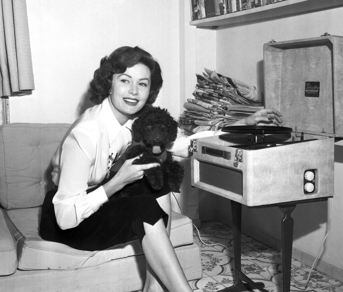 Lovely Rhonda Fleming in her penthouse apartment in Italy on March 1, 1955. (Jim Pringle/AP Photo)