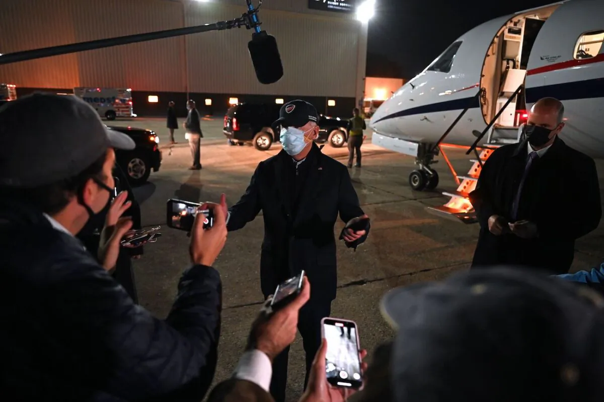 Democratic presidential candidate and former Vice President Joe Biden speaks with the press at the Detroit airport in Detroit, Michigan, on Oct. 16, 2020. (Jim Watson/AFP via Getty Images)