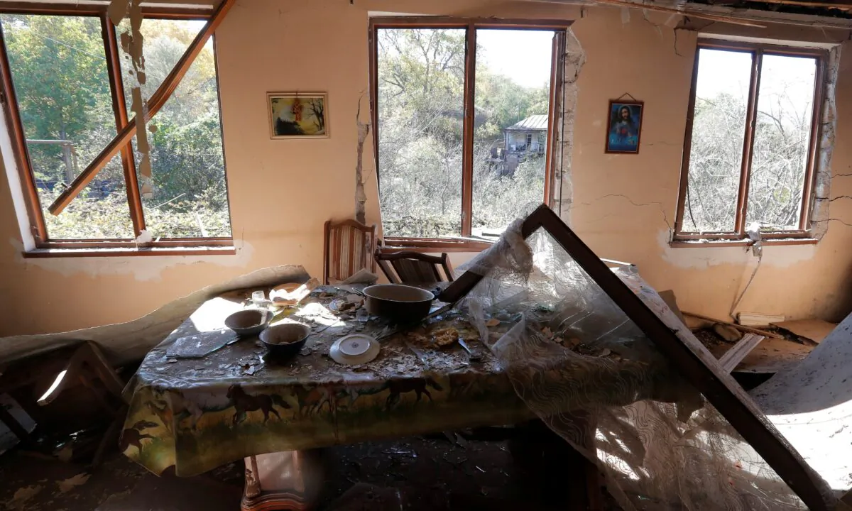 An interior view shows a damaged house following recent shelling in the settlement of Shosh in the course of a military conflict over the breakaway region of Nagorno-Karabakh, on Oct. 17, 2020. (Stringer/Rueters)