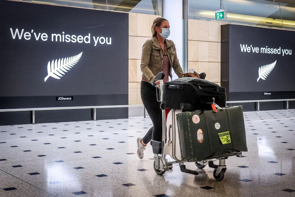Arrival from New Zealand at Sydney International Airport in Sydney, Australia, on Oct. 16, 2020. (David Gray/AFP via Getty Images)