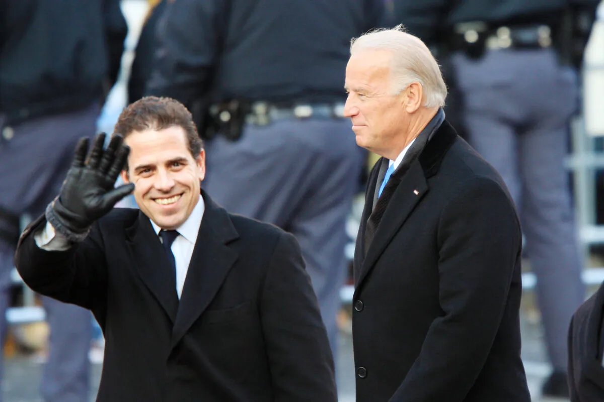 Vice-President Joe Biden and sons Hunter Biden (L) and Beau Biden walk in the Inaugural Parade in Washington Jan. 20, 2009. (David McNew/Getty Images)