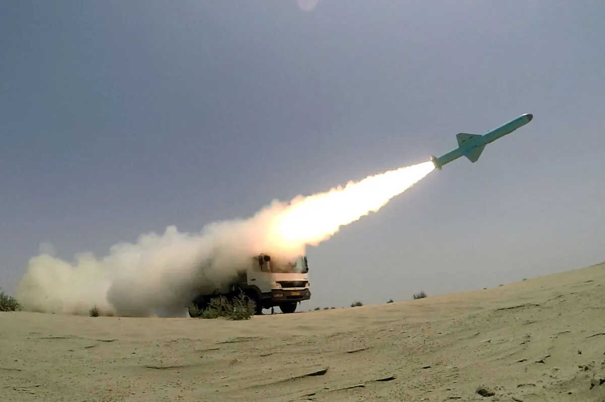 An Iranian locally made cruise missile is fired during war games in the northern Indian Ocean and near the entrance to the Gulf, Iran, on June 17, 2020. (West Asia News Agency via Reuters)