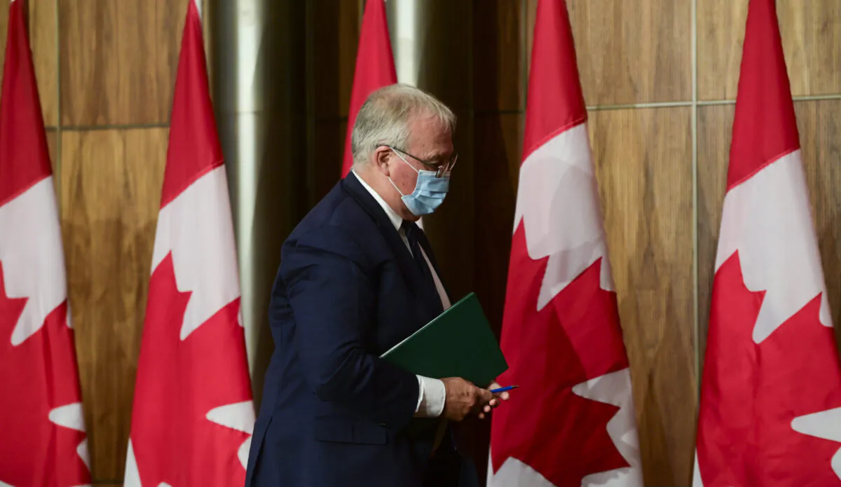 Bill Blair, Minister of Public Safety and Emergency Preparedness, leaves after taking part in a press conference in Ottawa on Monday, Oct. 19, 2020. (THE CANADIAN PRESS/Sean Kilpatrick)