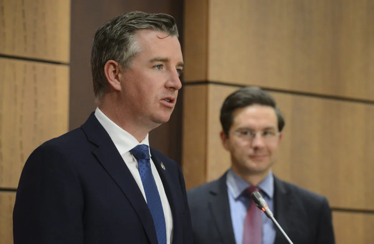 Conservative MPs Michael Barrett and Pierre Poilievre hold a press conference on Parliament Hill in Ottawa on Jul. 29, 2020. (Sean Kilpatrick/The Canadian Press)