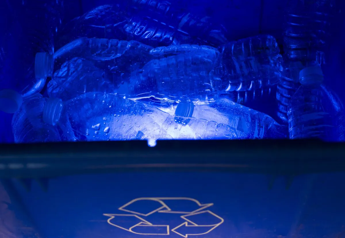 Plastic water bottles are pictured in a blue box recycle bin in North Vancouver, B.C., Canada on May 7, 2019. (Jonathan Hayward/The Canadian Press)