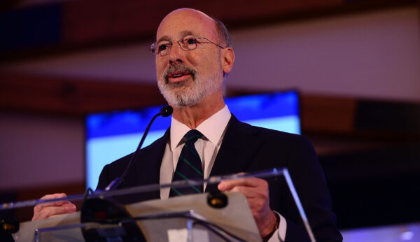Pennsylvania Gov. Tom Wolf speaks on stage