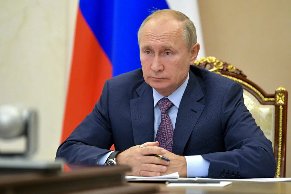 Russian President Vladimir Putin chairs a Security Council meeting via video conference in Moscow, Russia, Oct. 14, 2020. (Alexei Druzhinin, Sputnik, Kremlin Pool Photo via AP)
