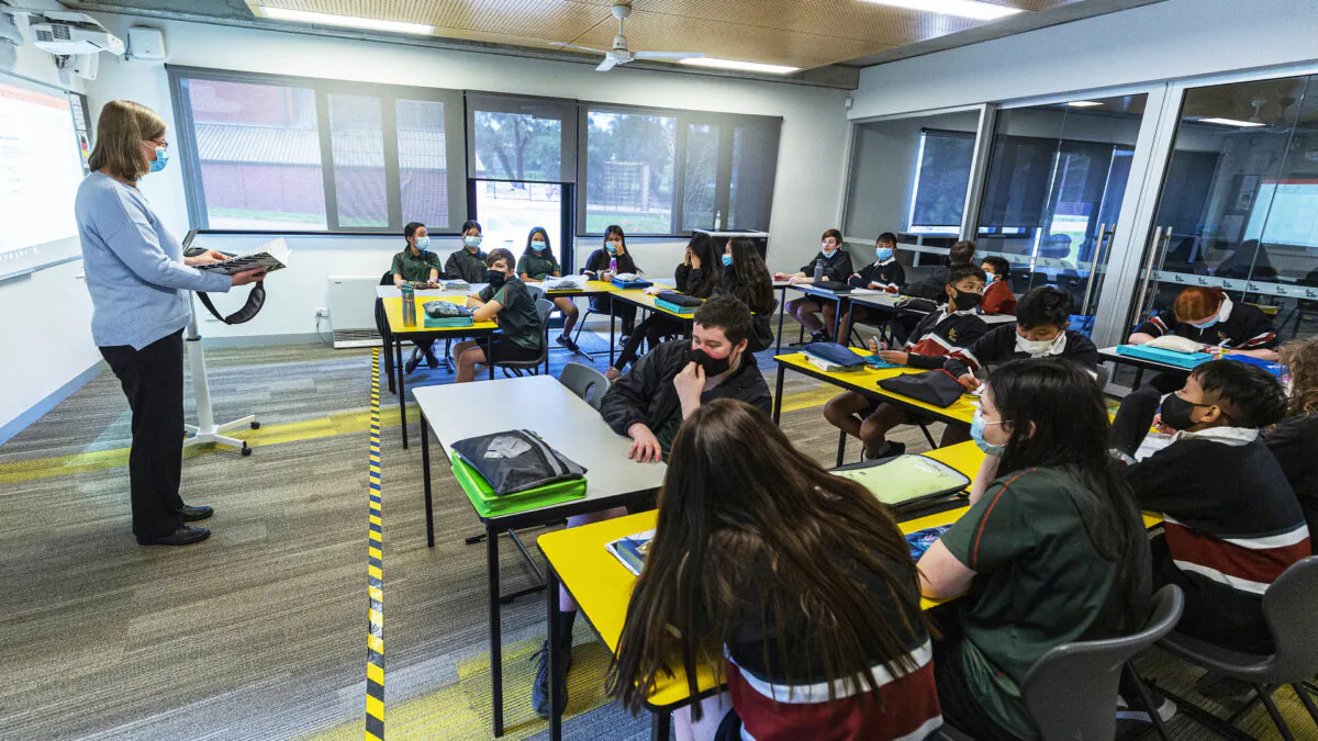 Yellow and black tape marks an area on the floor for teachers to be socially distanced from students in class at Melba Secondary College in Melbourne, Australia on Oct. 12, 2020. (Daniel Pockett/Getty Images)