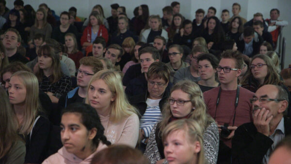 Students and locals attending the talk by Manny Drukiet