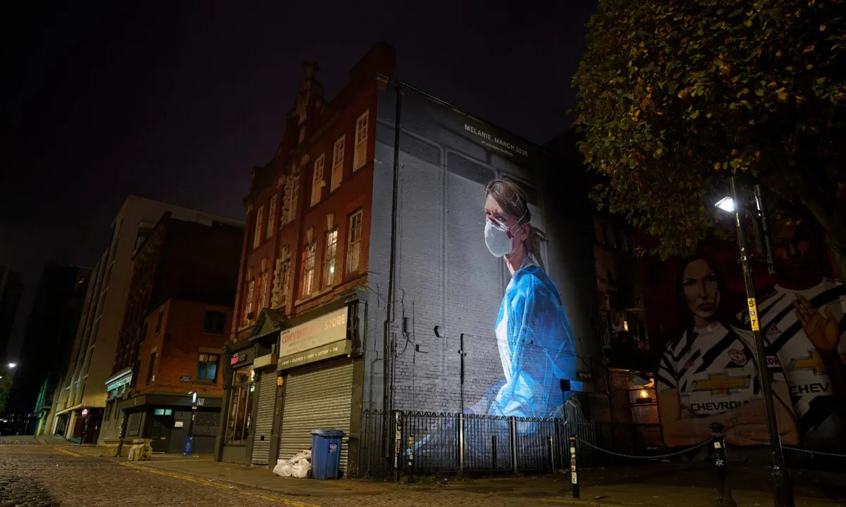 A mural depicting NHS nurse Melanie Senior in Manchester's Northern Quarter on Oct. 19, 2020.  (Christopher Furlong/Getty Images)