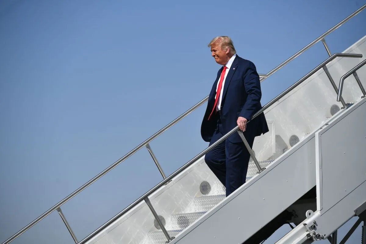 President Donald Trump steps off Air Force One upon arrival at Phoenix Sky Harbor International Airport in Phoenix, Arizona, on Oct. 19, 2020. (Mandel Ngan/AFP via Getty Images)