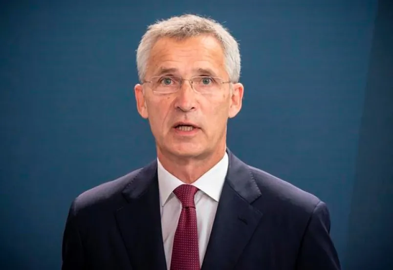 NATO Secretary-General Jens Stoltenberg talks to the media after a meeting with German Chancellor Angela Merkel in the Chancellery in Berlin, Germany, on Aug. 27, 2020. (THE CANADIAN PRESS/Michael Kappeler/Pool via AP)