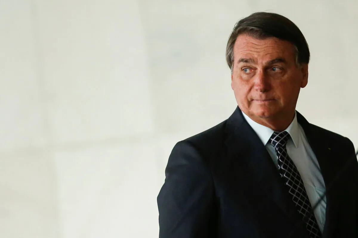 Brazil's President Jair Bolsonaro looks on before delivering a statement to the media with U.S. National Security Advisor Robert O'Brien (not pictured) at the Itamaraty Palace in Brasilia, Brazil, on Oct. 20, 2020. (Adriano Machado/Reuters)