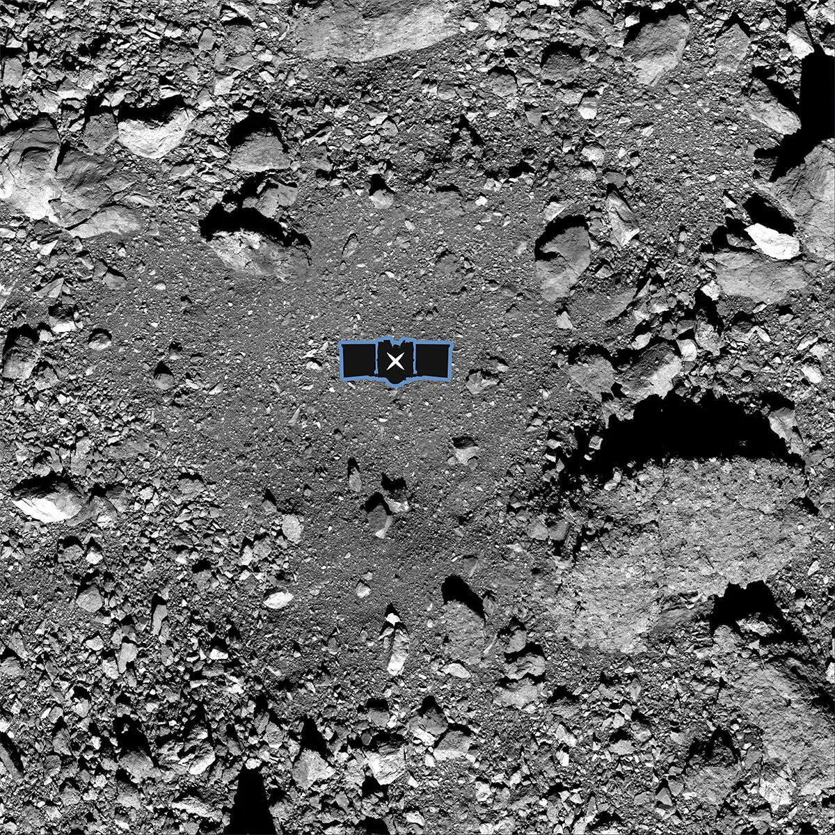 This undated image made available by NASA shows the OSIRIS-REx spacecraft's primary sample collection site, named "Nightingale," on the asteroid Bennu. After almost two years circling the ancient asteroid the spacecraft descended to the surface and snatched a handful of rubble on Oct. 21, 2020. (NASA/Goddard/University of Arizona via AP)