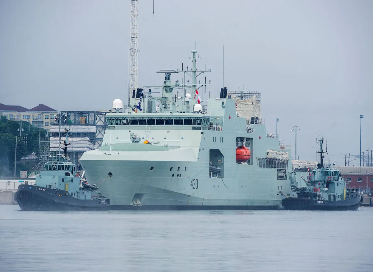 HMCS Harry deWolf heads from the Irving-owned Halifax Shipyard on its way to being delivered to the Royal Canadian Navy dockyard in Halifax on July 31, 2020. (The Canadian Press/Andrew Vaughan)
