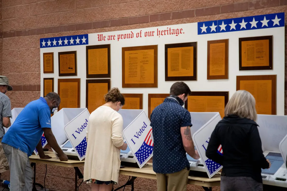 Voters cast their ballots at an early vote location at the Charleston Coliseum and Convention Center in North Charleston, S.C., on Oct. 16, 2020. (Logan Cyrus/AFP via Getty Images)