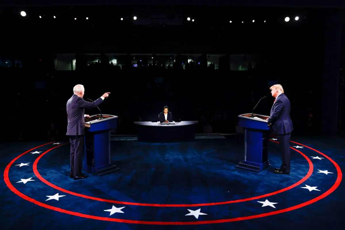 President Donald Trump (R), Democratic Presidential candidate former Vice President Joe Biden, and moderator NBC News anchor Kristen Welker (C) participate in the final presidential debate at Belmont University in Nashville, Tennessee, on Oct. 22, 2020. (Jim Bourg/Pool/AFP via Getty Images)
