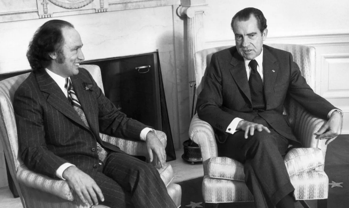 President Richard Nixon, right, consults Canadian Prime Minister Pierre Trudeau on Nixon's trip to Communist China, at the White House in Washington in Dec. 12, 1971. (Hulton Archive/Getty Images)