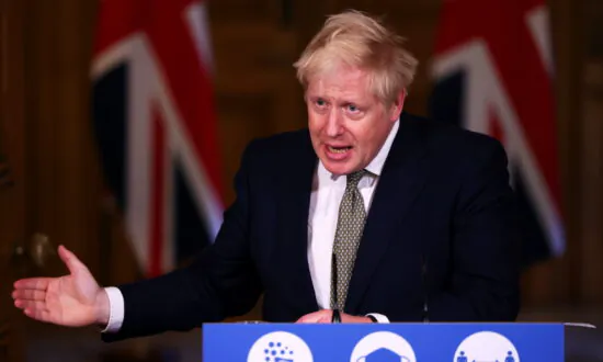 Johnson Defends Test and Trace, Tells People to Follow Self-Isolation Rules