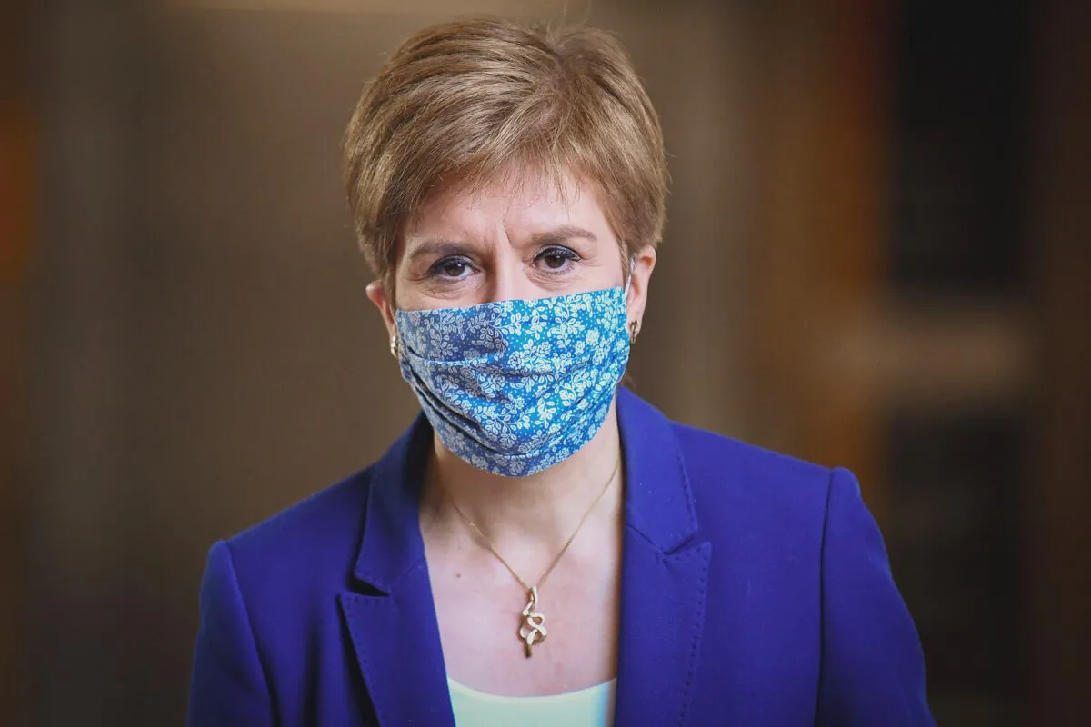 Scotland's First Minister Nicola Sturgeon wears a protective face covering as she arrives for First Minister's Questions at the Scottish Parliament, in Edinburgh, Scotland, on Oct. 8, 2020.  (Jeff J Mitchell/POOL/AFP via Getty Images)