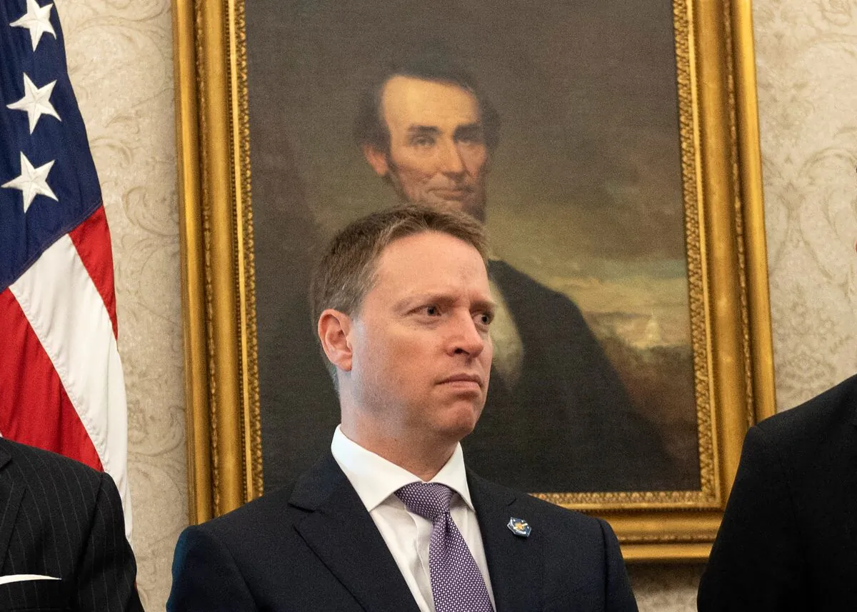 United States Deputy National Security Adviser Matthew Pottinger looks on as U.S. President Donald Trump speaks in the Oval Office of the White House in Washington, on Sept. 11, 2020. (Andrew Caballero-Reynolds/AFP via Getty Images)