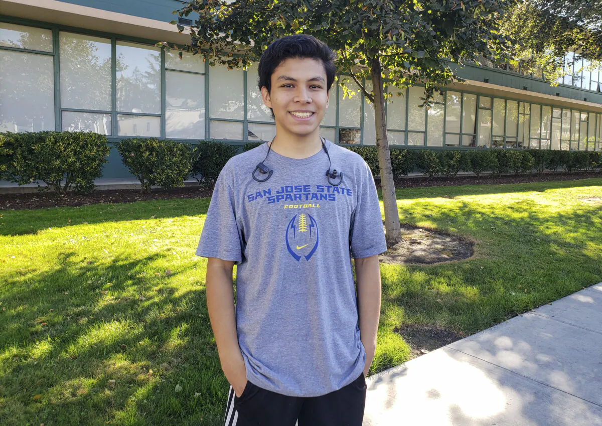 Manny Sanchez, a sophomore, stands on campus at San Jose State University San Jose, Calif., on Oct. 21, 2020. (David Lam/The Epoch Times)