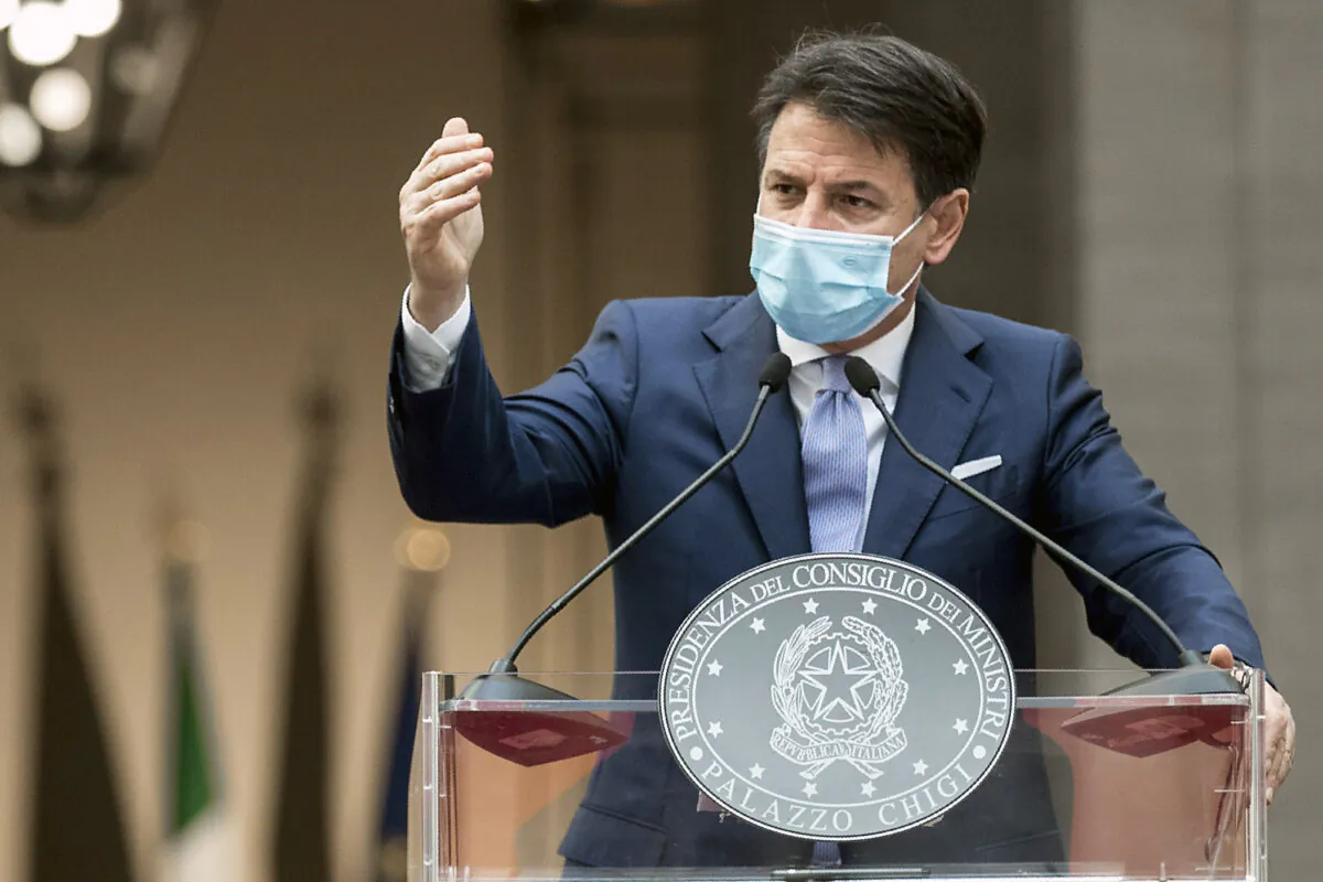 Italian Premier Giuseppe Conte announces new rules to curb the spread of COVID-19, in Rome, on Oct. 25, 2020. (Roberto Monaldo/LaPresse via AP)