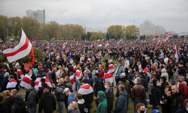 People attend an opposition rally
