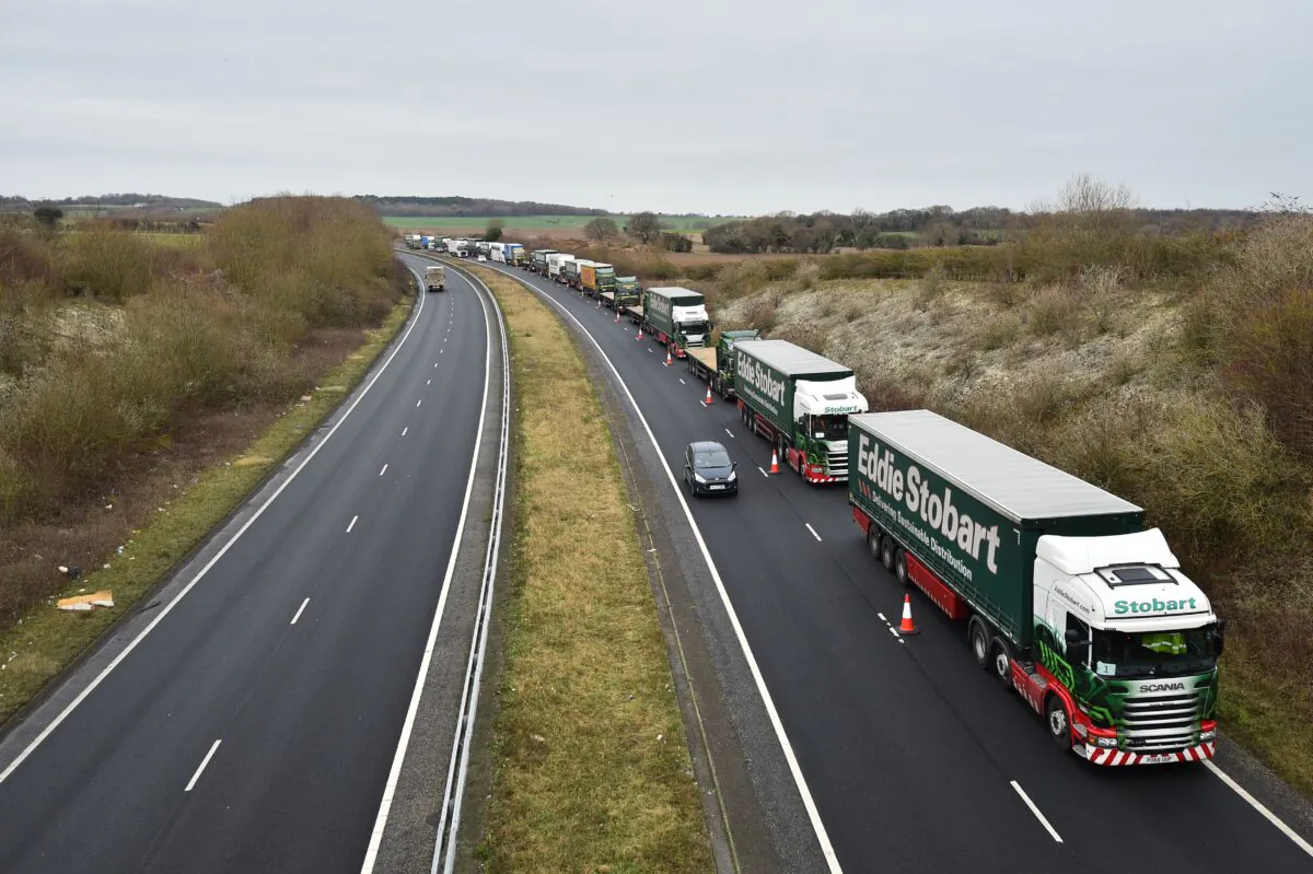Lorries are held in a formation as they take part in a trial to tackle potential post-Brexit traffic queues, on the A256 a few miles north of Dover in southern England, on Jan. 7, 2019. (Glyn Kirk/AFP via Getty Images)