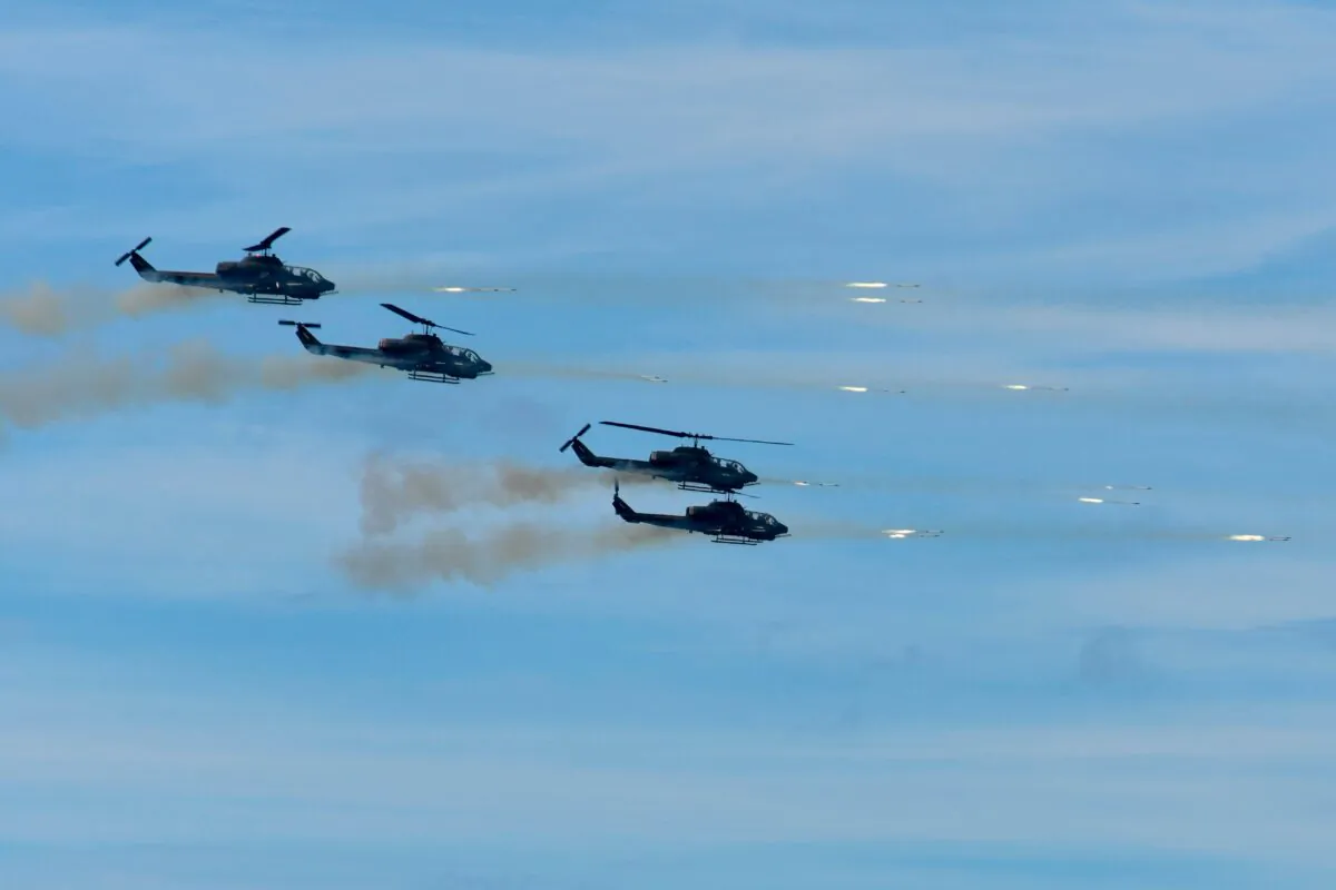 Four US-made AH-1W SuperCobras attack helicopters launch rockets during the 35th "Han Kuang" military drill in southern Taiwan's Pingtung county on May 30, 2019.  (Sam Yeh/AFP via Getty Images)