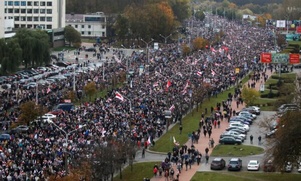 People attend an opposition rally