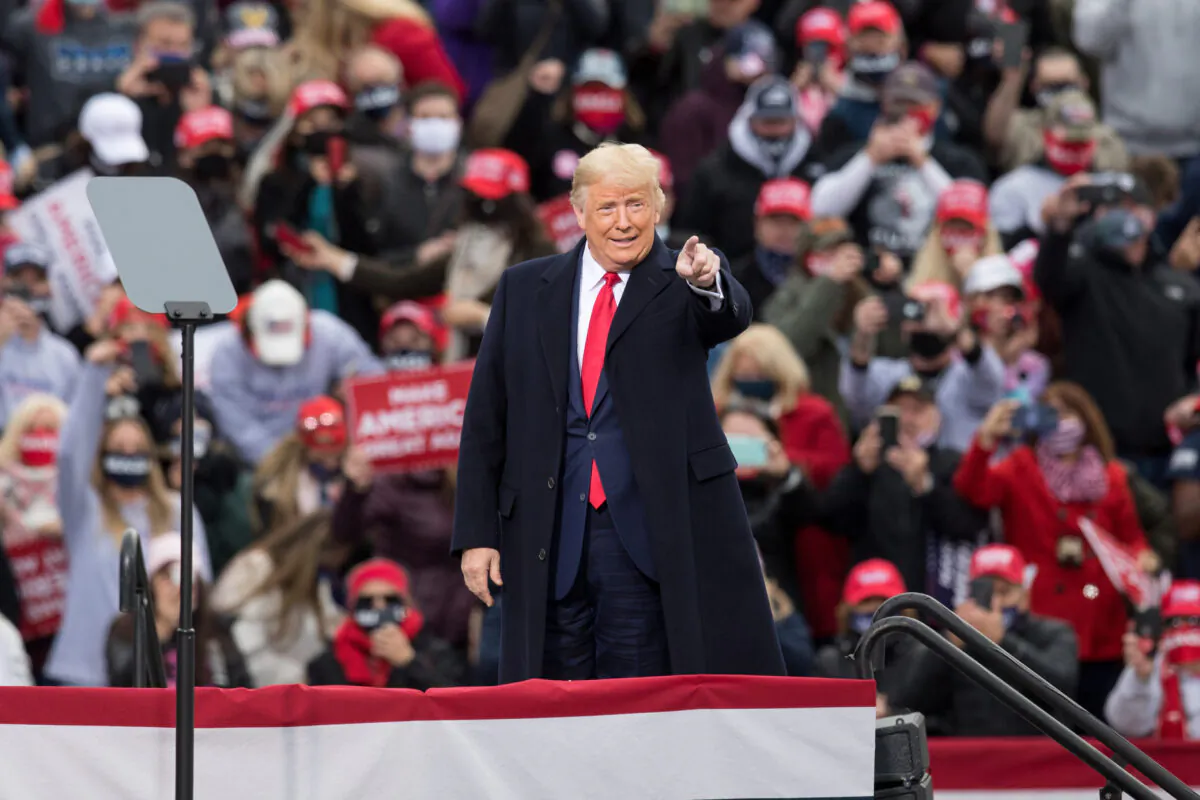 President Donald Trump gestures at supporters during a campaign rally in Londonderry, New Hampshire, on Oct. 25, 2020. (Scott Eisen/Getty Images)