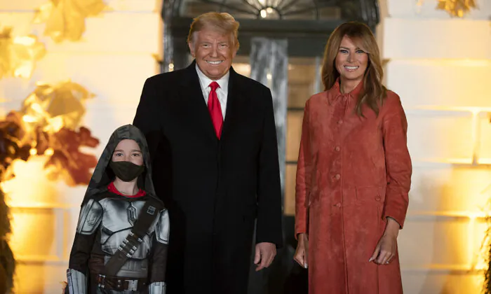 President Donald Trump and First Lady Melania Trump great guests on the south lawn of the White House on Oct. 25, 2020 in Washington. (Tasos Katopodis/Getty Images)