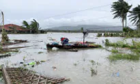 Typhoon Leaves 13 Missing, Displaces Thousands in Philippines