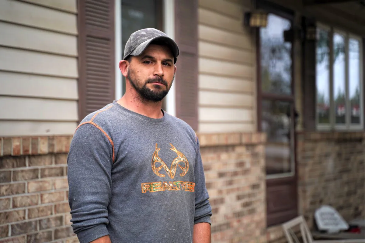 Bobby Tisdell stands in front of his home in West Terre Haute, Vigo County, Ind., on Oct. 20, 2020. (Cara Ding/The Epoch Times)