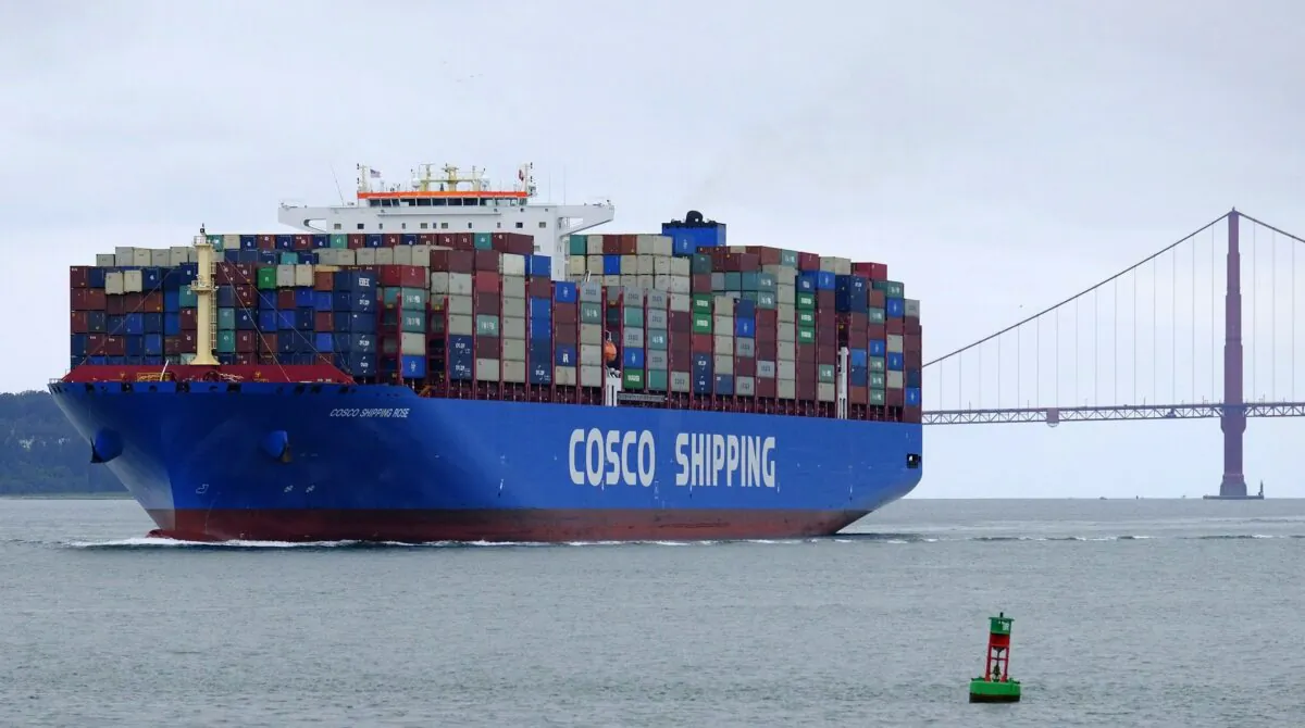 A Cosco container ship from China passes the Golden Gate Bridge in San Francisco on May 14, 2019. (Eric Risberg /AP Photo)