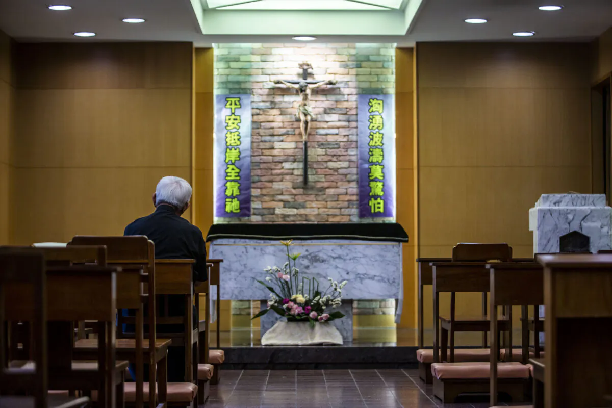 Cardinal Joseph Zen, former bishop of Hong Kong, sits in the chapel at his residence in Hong Kong on Sept. 11, 2020. Zen fled the communist takeover of China as a teenager and found sanctuary in Hong Kong, a bastion of religious freedom that he now fears could disappear under Beijing's tightening grip. (Isaac Lawrence/AFP via Getty Images)
