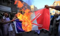 France Warns Citizens to Be Cautious Amid Muslim Fury Over Cartoons